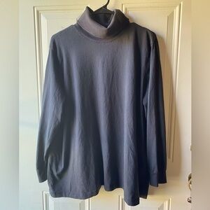 Woman Within Black Turtleneck